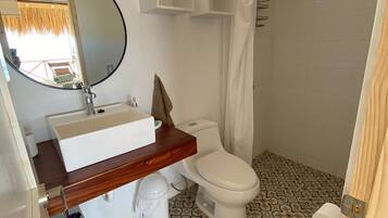 Shower, towels, soap, toilet paper