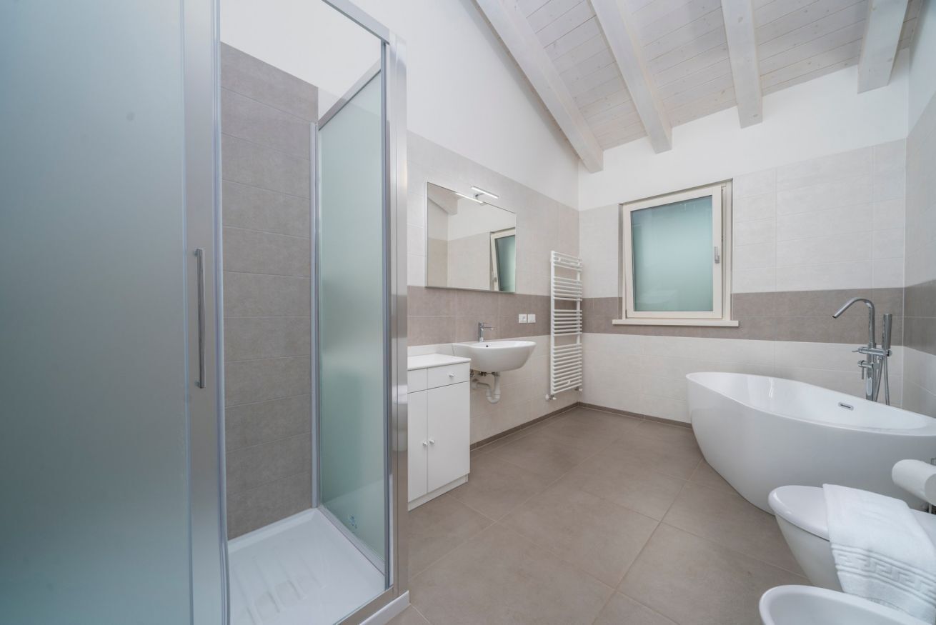 Bathtub, hair dryer, bidet