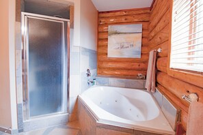 Jetted tub, hair dryer, towels, soap