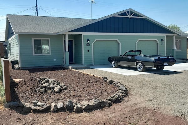 Newly built townhouse with 1100 sq. ft. of living space and single car garage.