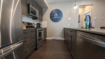 Condo, 2 Bedrooms | Private kitchen | Fridge, oven, coffee/tea maker, toaster