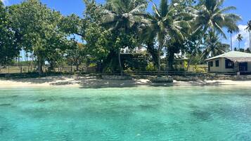 On the beach, sun-loungers, beach towels