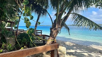 On the beach, sun-loungers, beach towels