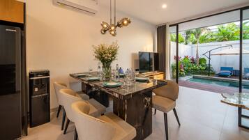Deluxe Villa, 3 Bedrooms, Non Smoking, Pool View | In-room dining