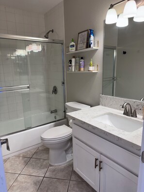 Hair dryer, towels, soap, shampoo