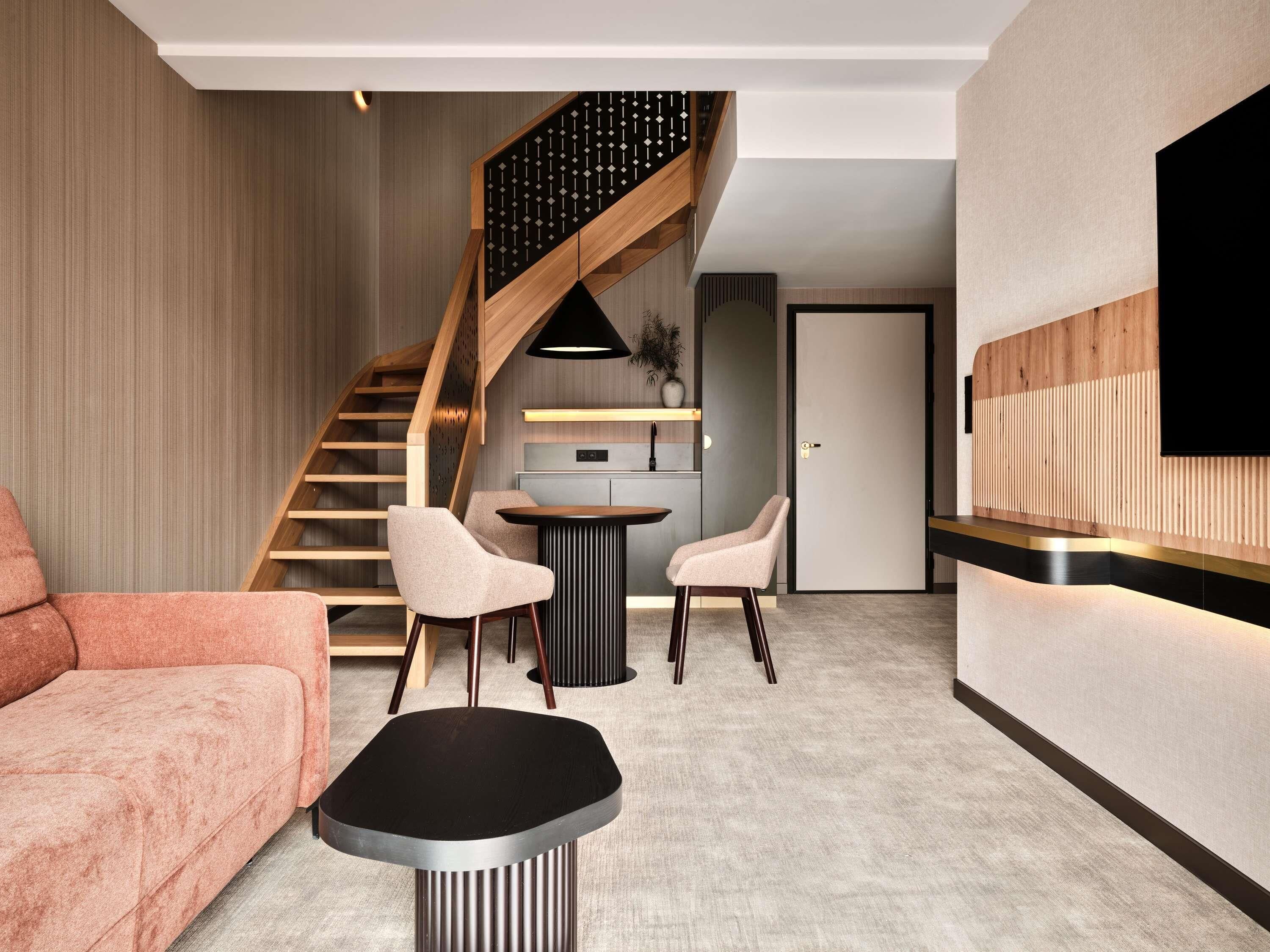 Deluxe Room, Multiple Beds | Minibar, in-room safe, desk, laptop workspace