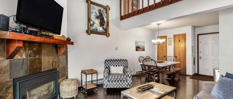 Smart TV, fireplace, books