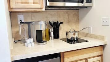 Fridge, microwave, stovetop, coffee/tea maker