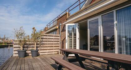 luxury apartment with waterside terrace