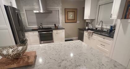 Beautiful beachside home perfect for your vacation with office and fenced yard!