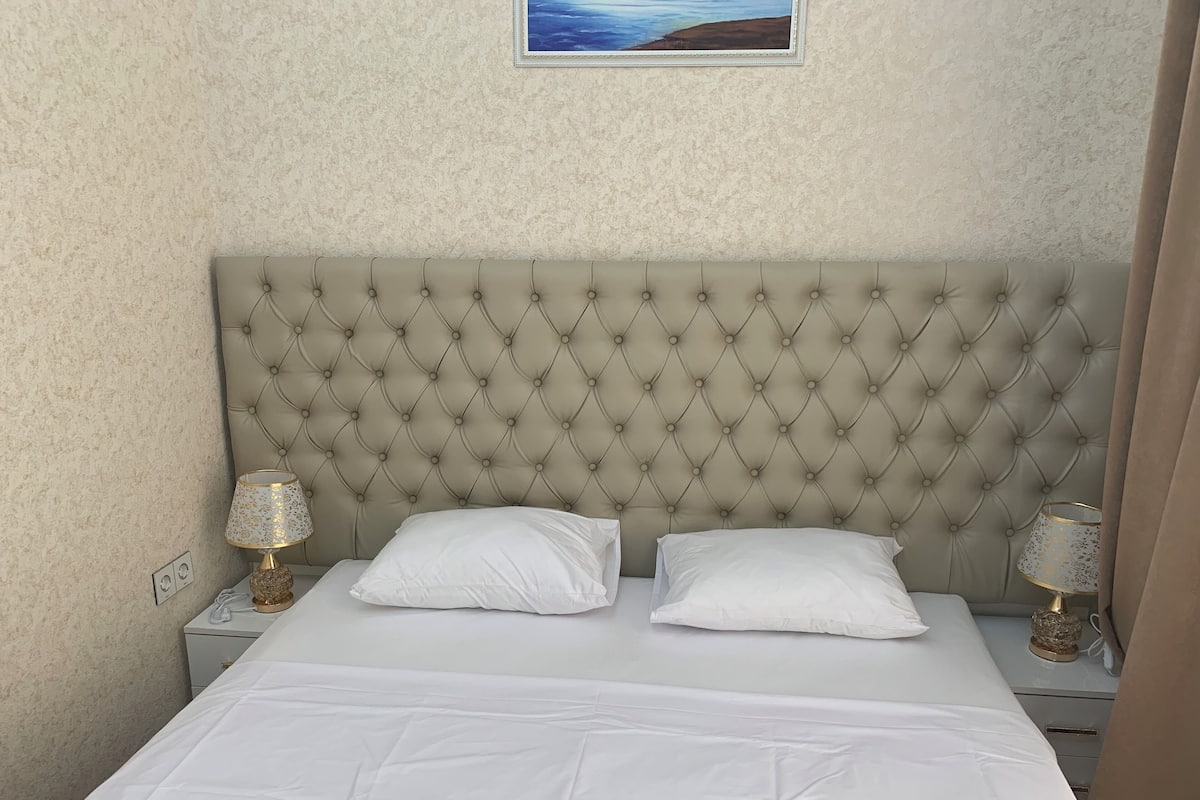 Tempur-Pedic beds, desk, laptop workspace, soundproofing