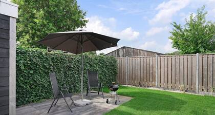 Brand new chalet with veranda, lots of comfort and spacious garden.