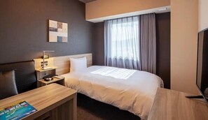Escritorio, tabla de planchar con plancha, wifi gratis y ropa de cama