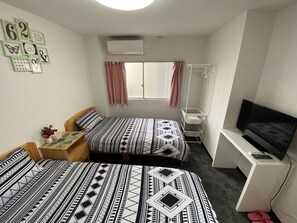 1 bedroom, desk, bed sheets