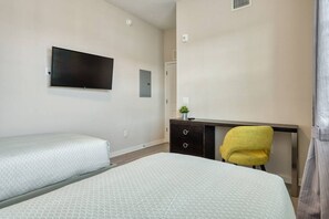 3 bedrooms, desk, iron/ironing board, travel cot