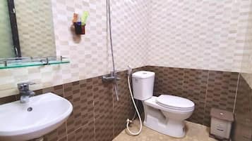 Shower, designer toiletries, hair dryer, bathrobes