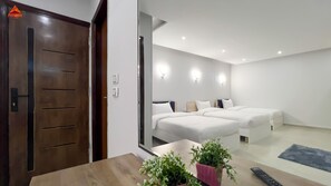 Family Triple Room, 3 Bedrooms, Mountain View | Egyptian cotton sheets, premium bedding, memory foam beds, minibar - pyramids tower view inn (Giza)