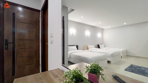 Family Triple Room, 3 Bedrooms, Mountain View | Egyptian cotton sheets, premium bedding, memory-foam beds, minibar