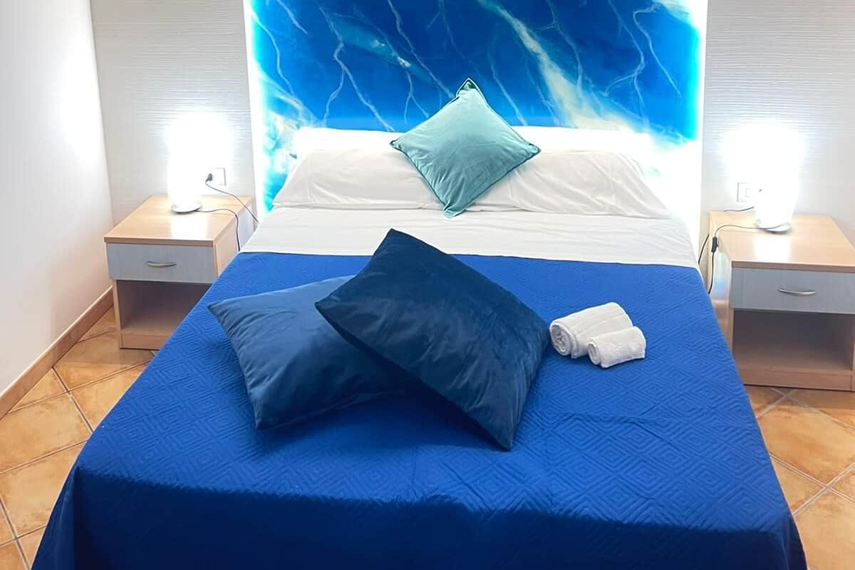 Eenvoudige vierpersoonskamer (Azzurra) | Gratis wifi