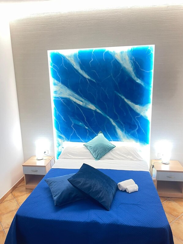 Basic Quadruple Room (Azzurra) | Free WiFi