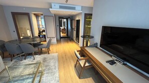 Three-Bedroom Apartment | Living area | LCD TV, Netflix, streaming services - Kings Cross Hotel Istanbul (Istanbul)