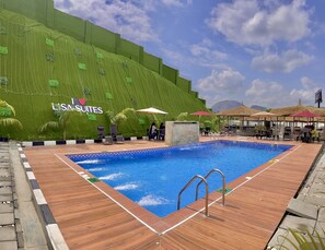 Outdoor pool, lifeguards on site - Lisa Suites (Abuja)