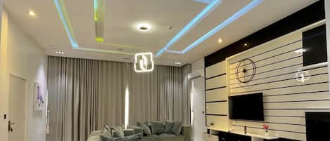 Family Suite, 2 Bedrooms, City View | Living area | Flat-screen TV, video-game console, Netflix, DVD player