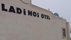 A building with the sign "LADÍNOS OTEL" indicating a hotel.