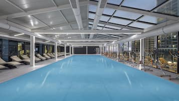 Indoor pool, open 9:00 AM to 10:00 PM, pool umbrellas, sun loungers