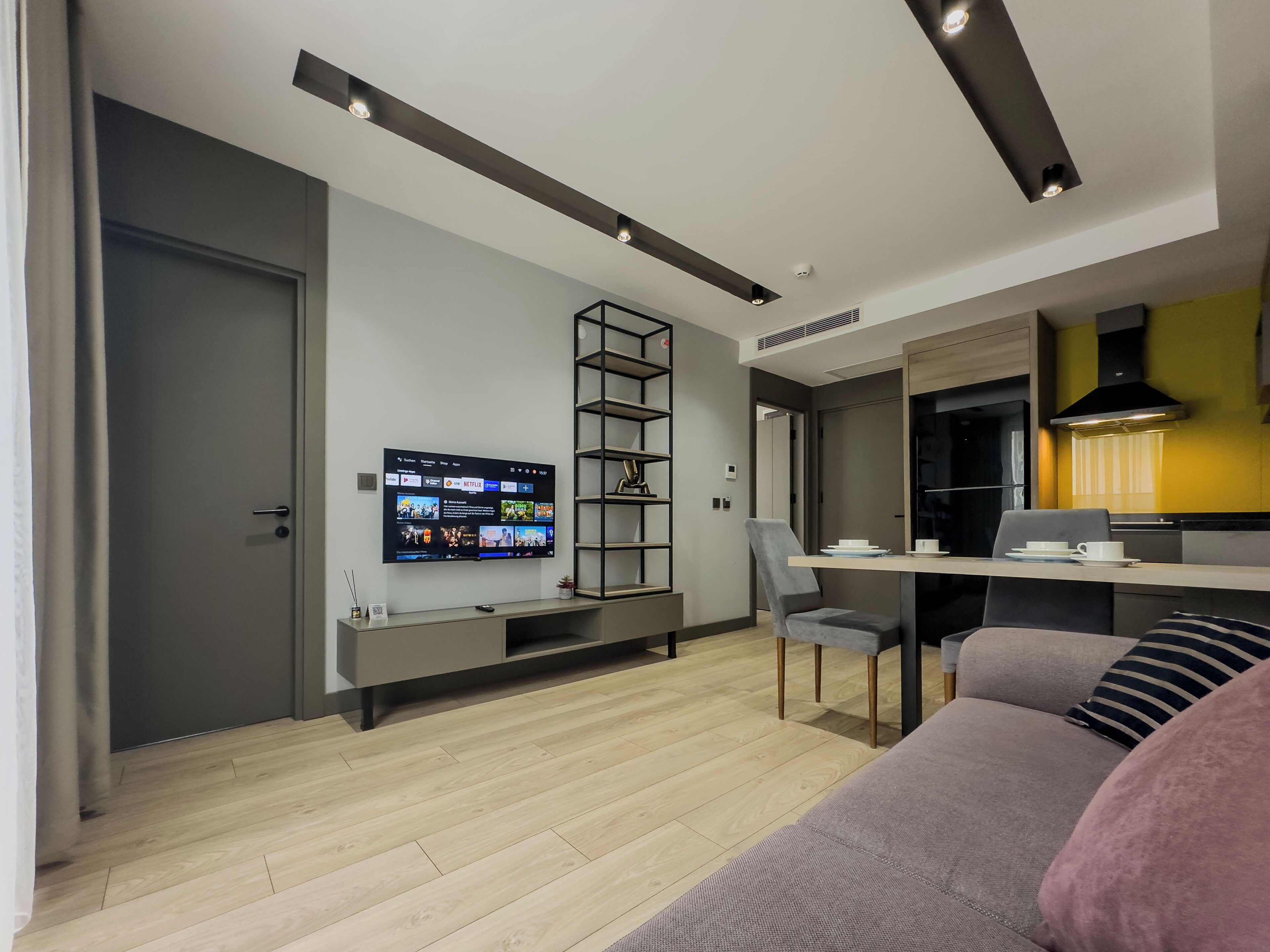 City Suite, Garden View | Living area | 82-cm Smart TV with satellite channels