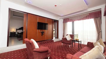 Executive Suite | Living area | 32-inch LED TV with cable channels