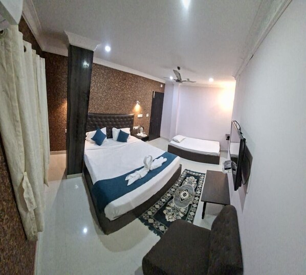 Habitación triple Deluxe | Wifi gratis