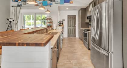 Awesome Location with Dock, Pool, Bicycles & Kayaks by RedAwning