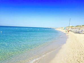Sun-loungers, beach towels
