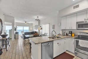 Private kitchen - Stunning Oceanfront Condo With Resort Amenities 3 Bedroom Condo by RedAwning (Orange Beach)