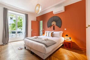 2 slaapkamers, een strijkplank/strijkijzer, gratis wifi, beddengoed