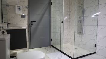 Royal Suite, Sea View | Bathroom | Hair dryer, bathrobes, towels, soap