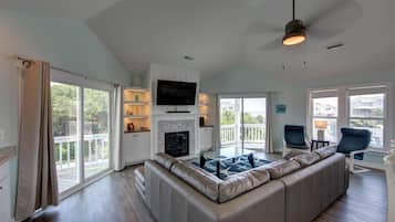 Smart TV, fireplace, books