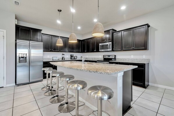 Fridge, microwave, coffee/tea maker, toaster