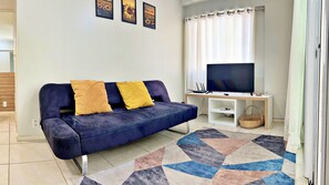 Apartamento | Área de estar | Smart TV 42 polegadas com canais digitais, Netflix