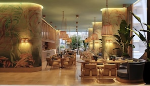 A spacious hotel lobby with high ceilings, large windows, and a central dining area.
