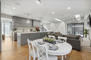 55-inch LED TV with digital channels, MP3 dock - EastVillage Signature Villas by Dunyha (Dallas)