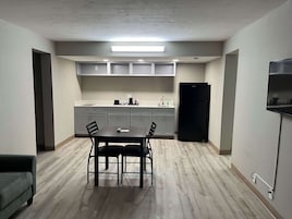 Stovetop, freezer, dining tables