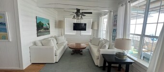 Historical converted tavern surrounded by water, fabulous views, private dock.