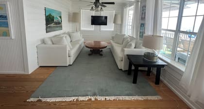 Historical converted tavern surrounded by water, fabulous views, private dock.