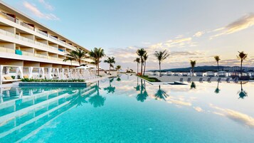 4 outdoor pools, cabanas (surcharge), sun loungers