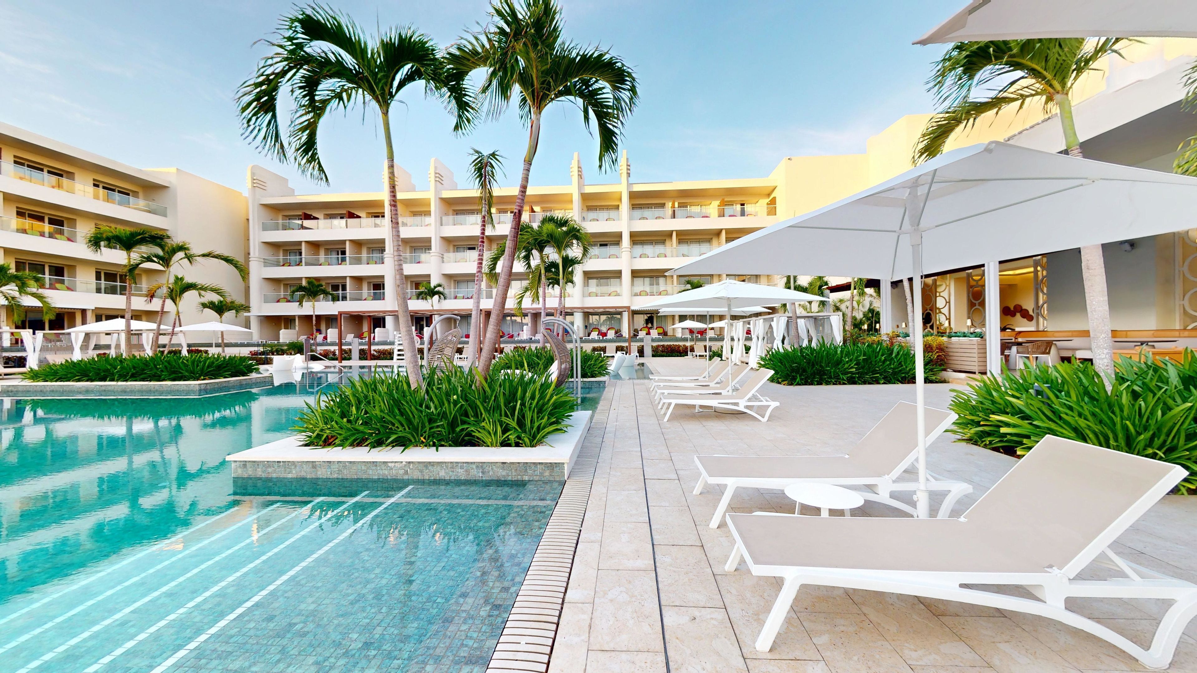 4 outdoor pools, pool cabanas (surcharge), pool umbrellas
