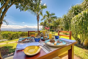 Enjoy a meal amidst breathtaking mountain and lush greenery views.