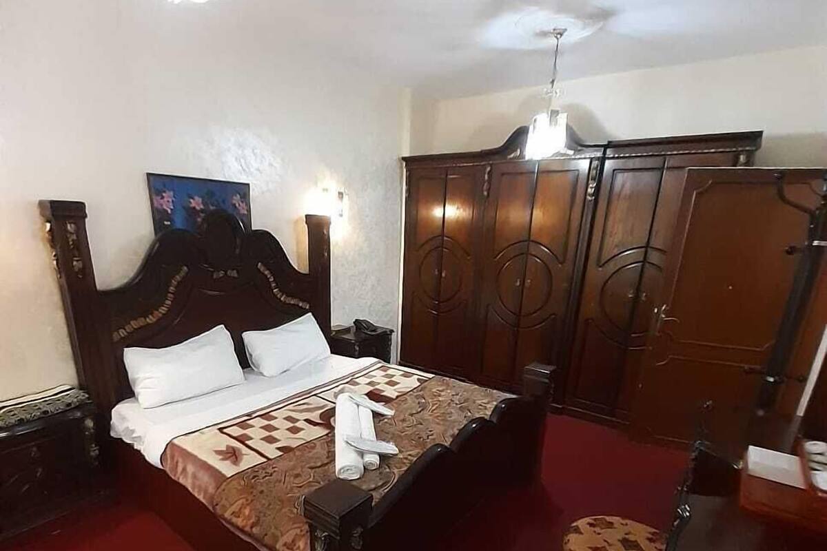 Standard Suite, 1 Queen Bed, Smoking, City View | 1 bedroom, hypo-allergenic bedding, memory-foam beds, in-room safe