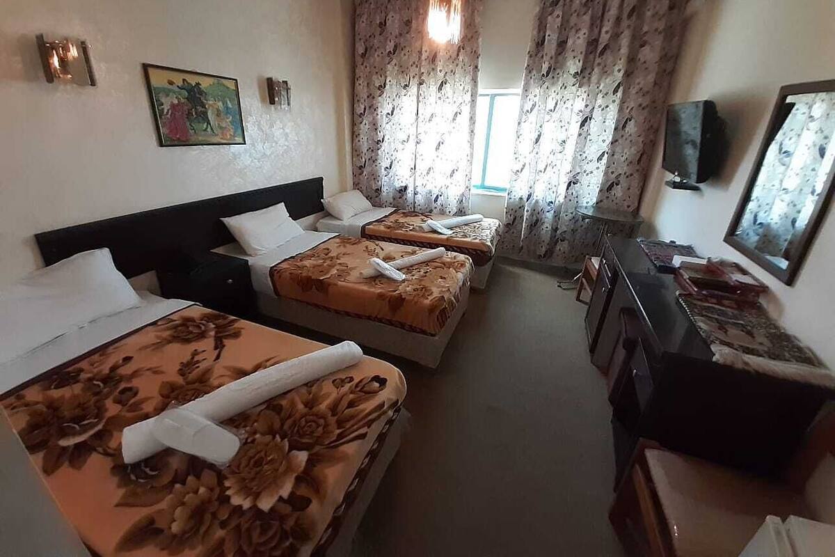 Standard Triple Room, Multiple Beds, Smoking, City View | 1 bedroom, hypo-allergenic bedding, memory-foam beds, in-room safe